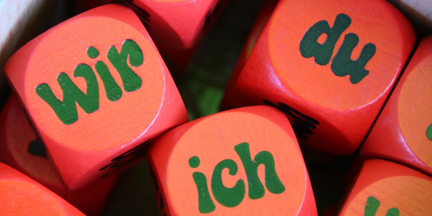 würfel mit der Aufschrift: wir, du, ich